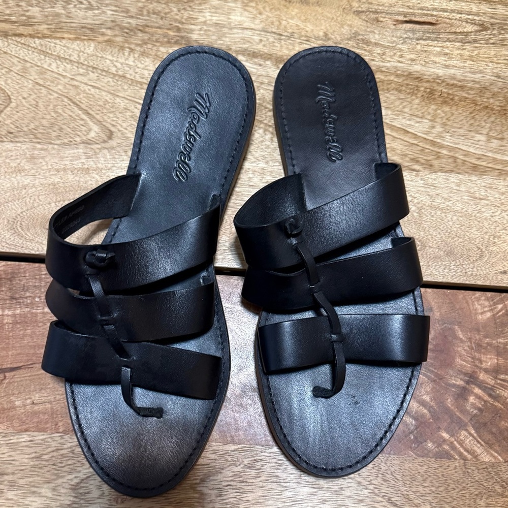Madewell black leather sandal.